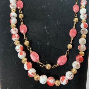 Necklace and earing set.  Peach and white glass beads
